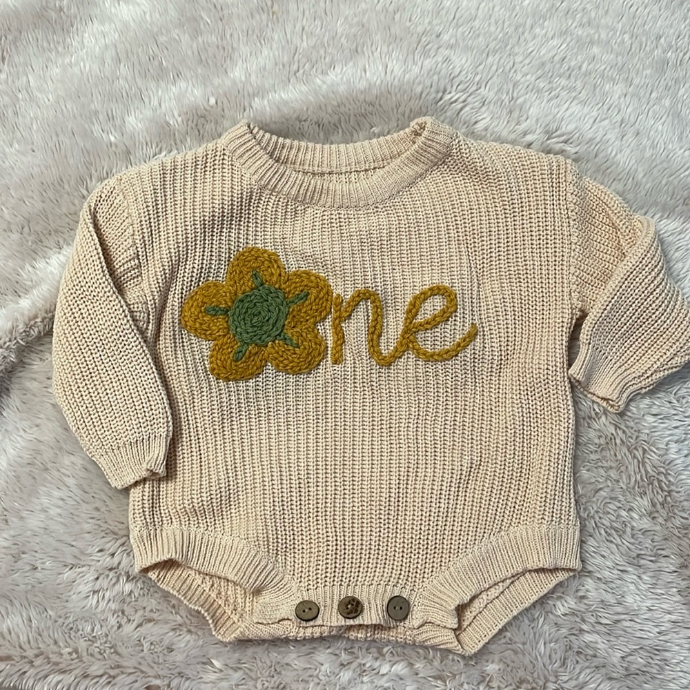 ‘One’ sweater